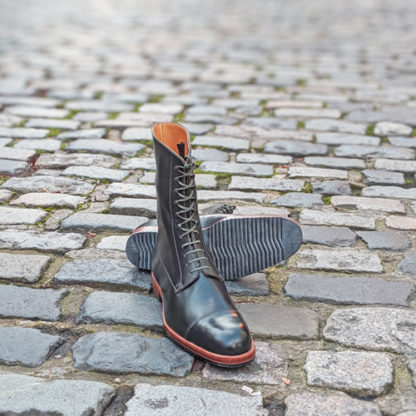 bespoke boots with a Serrac sticker sole
