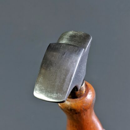 vintage heel iron with polished steel head