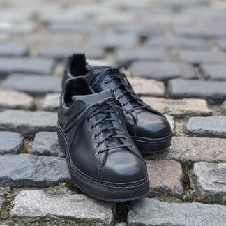 hand stitched black bespoke trainers